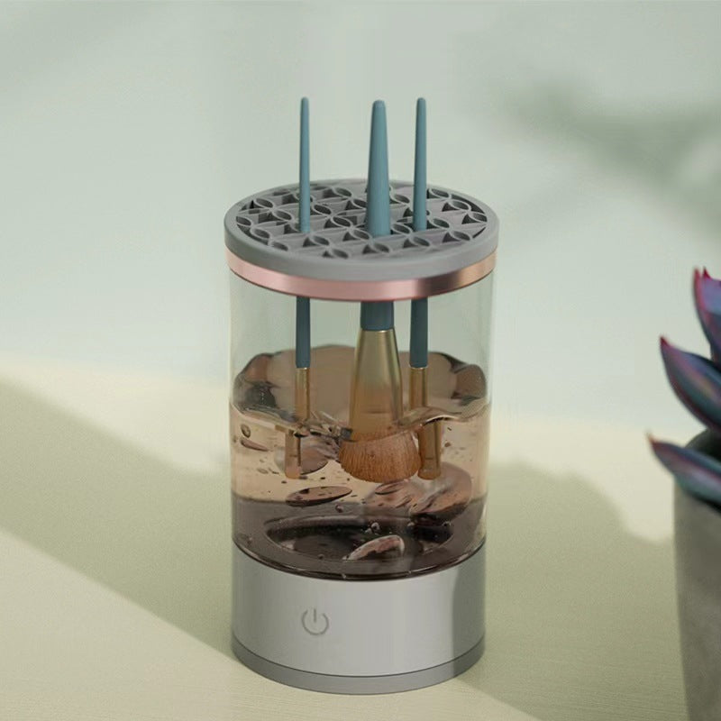 Elektrisk sminkborstrengörare med borste