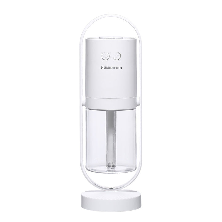 Vit mini-luftfuktare med färgglad projektion