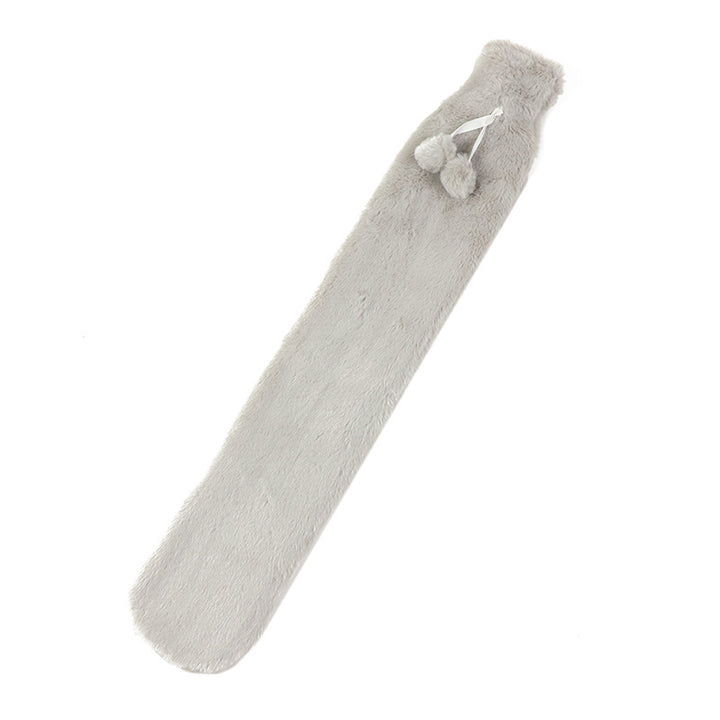 Lång värmeflaska med stickat överdrag