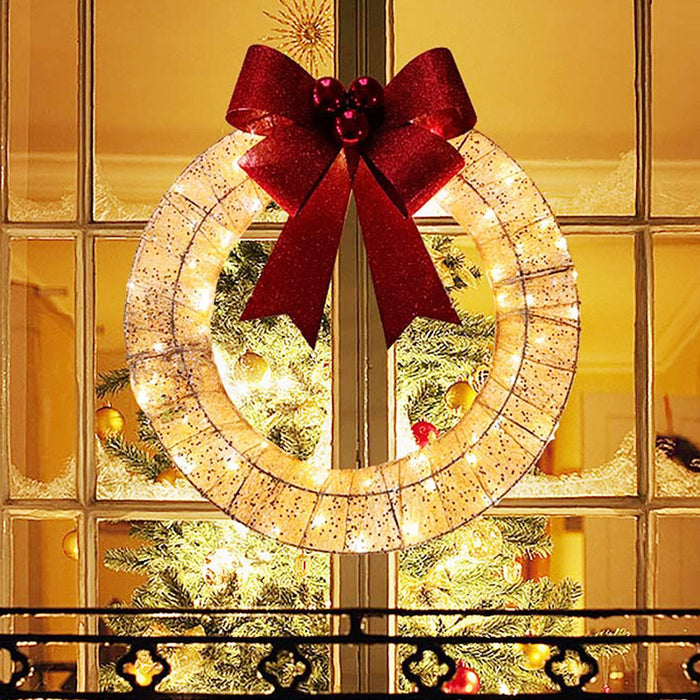 Trivhem Julkrans med LED-belysning och stor rosett – 50 cm, timer