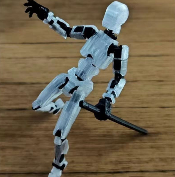 Orange 3D-printad robotfigur i pose