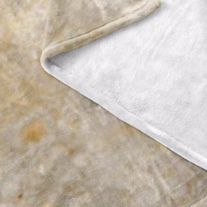 Rund tortillafilt på soffa