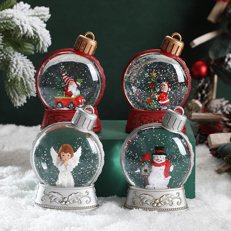 Upplyst glitterkula med snögubbe