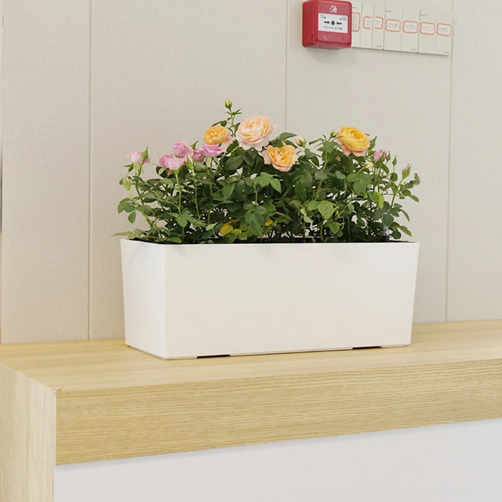 PureVase Kruka – Självvattnande blomkruka med vattennivåindikator
